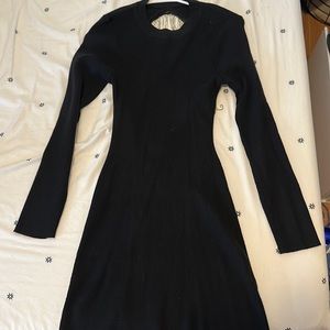 Black mini dress with rhinestone back.